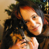 7 décembre 2008 : Cheyenne dans mes bras, devant le sapin de Noël. :)